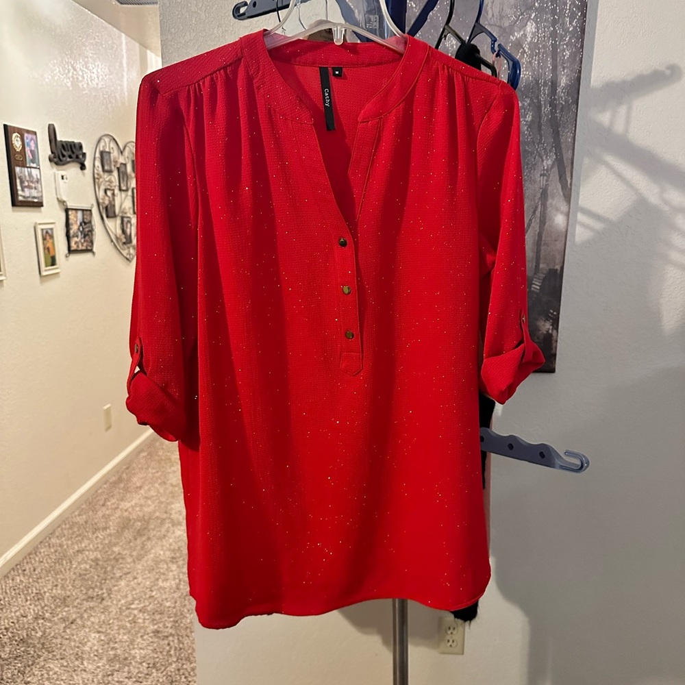 Red glittery blouse
